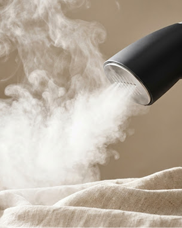 Steam from an iron over fabric